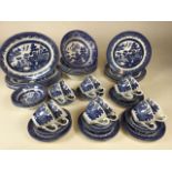 A quantity of Churchill Blue and White Willow Pattern china