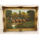 A large oil on canvas of a country scene in gilt frame. Size including frame W:107cm x H:77cm