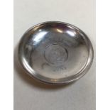 A sterling silver coin set pin dish by Lawrence Emanuel, Birmingham. 1901, Inscribed Krugers Last