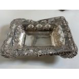 A Large silver cake dish. Hallmarked H.W.L Birmingham. Weight 525 grams. W:30cm x D:23cm