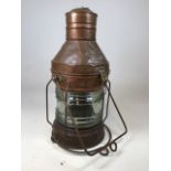 A large vintage copper and brass ships lamp not under command with original glass W:30cm x H:60cm