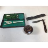 A boxed straight edge razor by JT Dale, Stirling, together with a ladies travelling accessory set