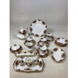 A quantity of Royal Albert Old Country Roses. Includes a tea pot, tea cups and saucers, tea plates a