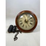 A 19th centurty Postmans alarm clock, the dial with Roman numerals 30cms overall two weights. W:30cm