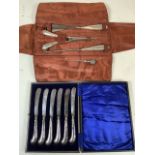 Silver handled button hooks, glove stretchers and a small shoe horn also with pistol grip knives