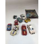 Nine vintage Scalextric cars with a 1992 catalogue