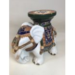 A decorative elephant jardiniere stand W:30cm x H:29cm