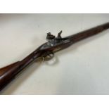 A Brown Bess Indian musket. Marked B S R. Engraved cat and Indian lettering. see photos. Length :