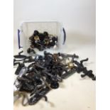 A quantity of metal door handles and other fixings