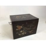 A lacquered Chinese box decorated with birds and blossom. Lined with green fabric W:32cm x D:25cm