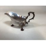 A silver sauce boat - hallmarked to base. 310gm
