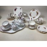 A quantity of part china teas sets including Colclough Roses, Duchess and Richard Ginori