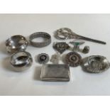 A. collection of un marked white metal items.