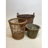 Three vintage wicker items, a baguette basket, log basket and a smaller painted basket. Baguette