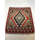 A small Chobi Kilim W:48cm x H:50cm