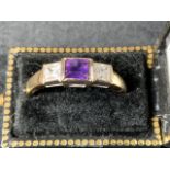 A 9ct gold amethyst and cubic zirconia stones. Size m. In black and gilt ring presentation box.