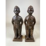 A Pair of cast metal fire sides companions, no fire tools. H:52cm