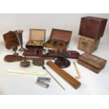 A wooden box with a quantity of draughts, another with wooden counters, a Dunhill cigar box, a