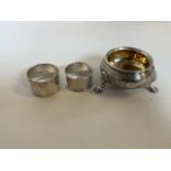 Silver hallmarked items, a large salt and two napkin rings. grams.