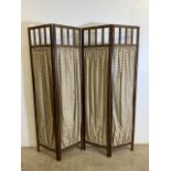 A 1940s oak folding screen with four privacy curtains with period valreas material. W:160cm x H: