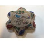 A antique Iroquois Native American Beaded Pin Cushion decorated with bird and leaves in shape of a