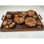 A collection of treen items with wooden tray.