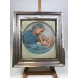 A religious plaque of Madonna and Child in a wooden silvered frame W:44cm x H:48cm Framed width W: