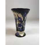 A Moorcroft vase in Kaffir Lily design designed by Shirley Hayes. Signed to base S Hayes and WM 10.