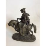 A bronze of a lady with falcon on horse W:25cm x H:30cm