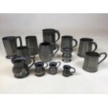 A quantity of old pewter tankards. One marked The Daily Telegraph and Morning Post Tournament (