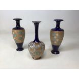 Three Doulton Lambeth vases One vase A/F. Impressed to base WR H:26cm