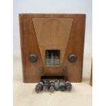 An Art Deco radio with additional valves. W:46cm x D:24cm x H:49cm