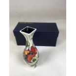 A contemporary Moorcroft vase in Demeter pattern with original box. Made for the Moorcroft