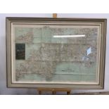 A England and Wales G W Bacon and Co.cycling road map in period frame. W:89cm x H:64cm