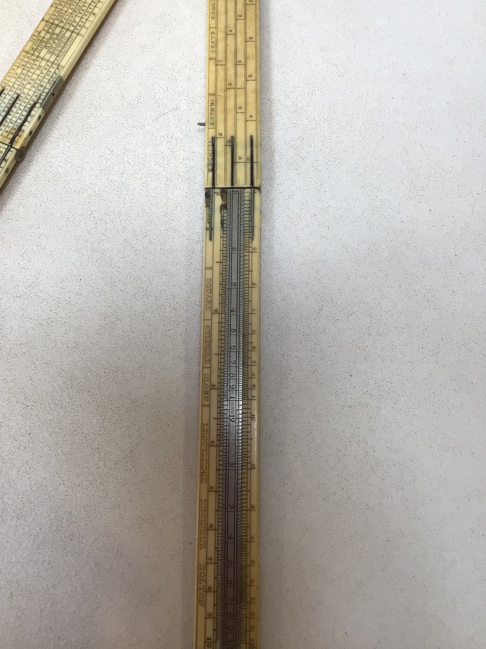 An ivory folding ruler by L Routledge, Engineer, Bolton. H:61cm fully extended - Image 7 of 10