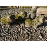 Three King Charles spaniels and a Siamese cat reconstituted stone garden animals with lichen.