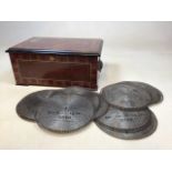 An Imperial music box with eleven discs. Wear to lid of box W:41cm x D:30cm x H:20cm