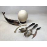 An ashtray in the form of a fish with engraved white metal head and tail, an ostrich egg, 3 oriental