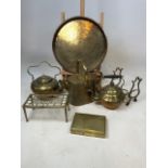 A heavy engraved brass charger W: 38cm also with 2 kettles, a trivet, a hot water can and a