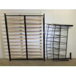 A modern metal framed double bed.