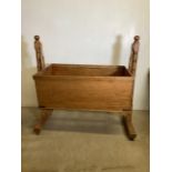 A Victorian pine swinging crib. W:120cm x D:61cm x H:120cm