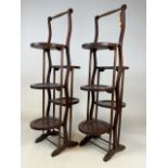 A pair of early 20th century mahogany folding cake stands. H:100cm