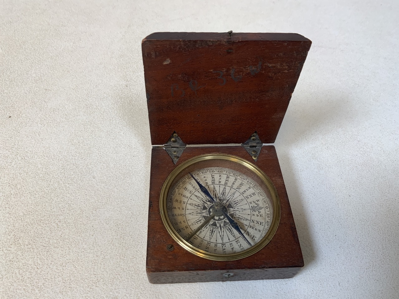 A nineteenth century mahogany cased pocket compass with paper dial and blue compass needle. No front - Image 8 of 8