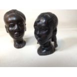 Two African carved female heads wooden heads. Split to 1 head - see photo H:19cm Tallest