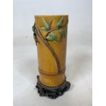 A Minton majolica vase styled as bamboo on ceramic decorative plinth. Chip to base (see photo) W: