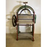 The ideal mangle, mid to early 20th century. Makers J Helson and sons, Exeter. H:153cm