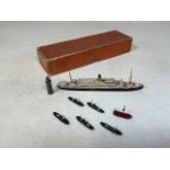 A boxed waterline Model Ship Almanzora with metal light house and 6 other boats W:15cm