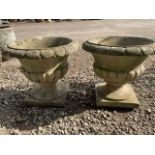 A pair of large reconstituted stone garden urns. W:56cm x D:56cm x H:50cm
