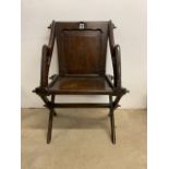 An early 20th century Glastonbury chair. W:68cm x D:50cm x H:89cm