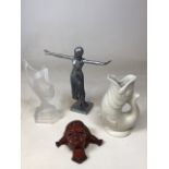 An Art Deco style figurine by Past Times, a glass Art Deco inspired figurine, a Gurgle jug